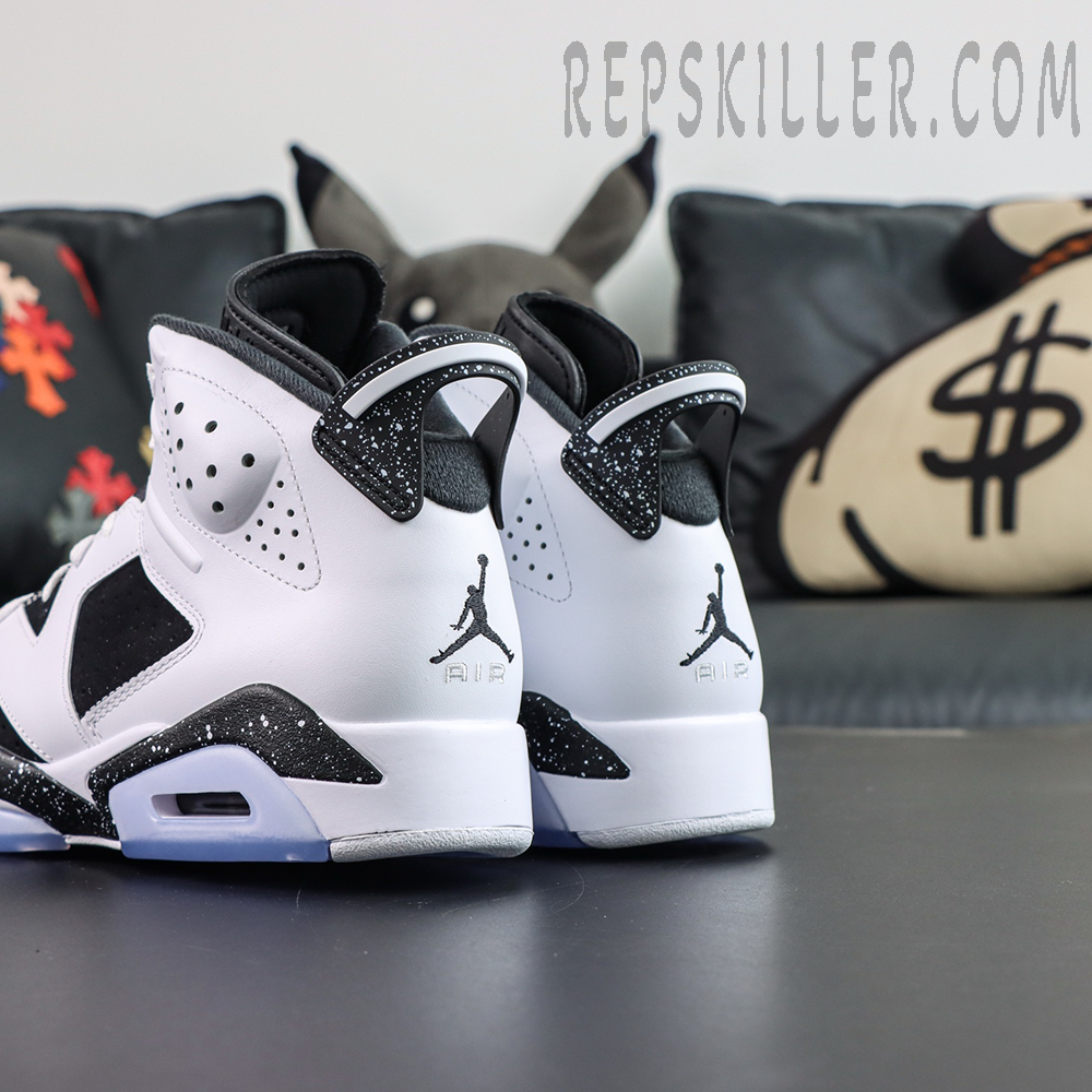 Jordan 6 “Oreo” rear side angle showcasing white leather upper with contrasting speckled midsole detailing