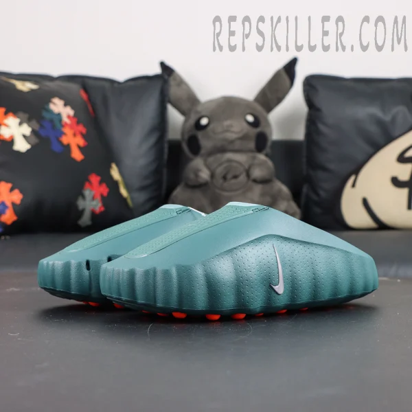 Nike Mind 001 “Mineral Slate” front angled view featuring a mineral green foam body with minimalist sculpted lines
