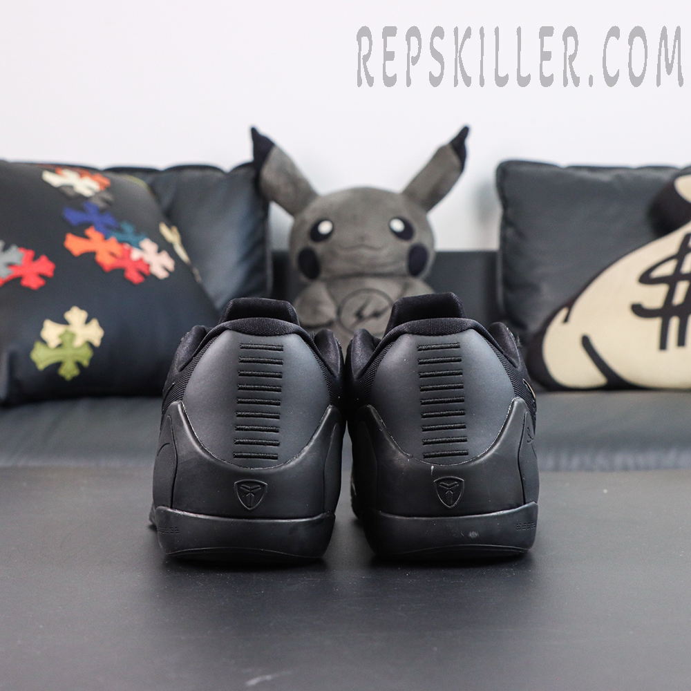 Kobe 9 Elite Low EM TB P Black heel view featuring the Kobe logo and structured support design