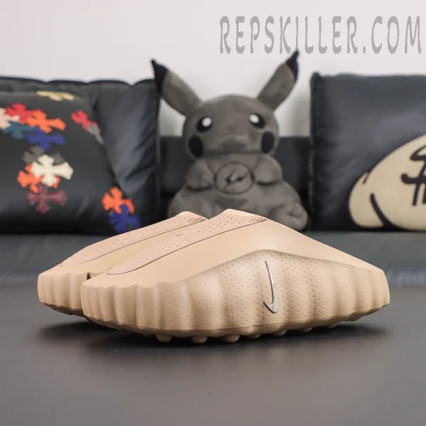 Nike Mind 001 ‘Hemp’ front side view featuring a tonal tan colorway and streamlined molded silhouette