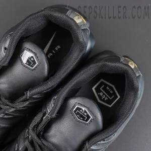 A-COLD-WALL x Nike Air Max Plus ‘Black’ tongue and interior close-up featuring black leather tongues, hexagonal ACW Air badges, and collaborative insole graphics