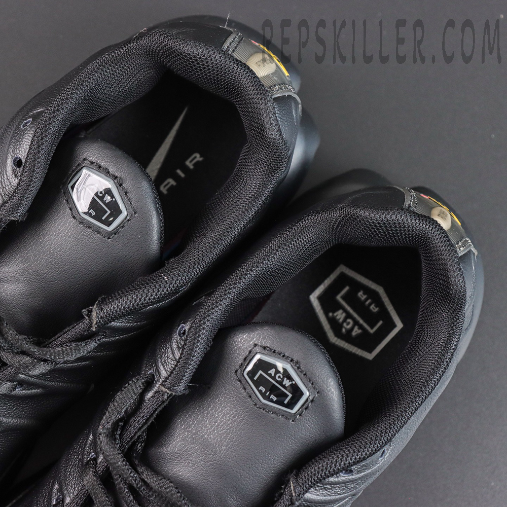 A-COLD-WALL x Nike Air Max Plus ‘Black’ tongue and interior close-up featuring black leather tongues, hexagonal ACW Air badges, and collaborative insole graphics