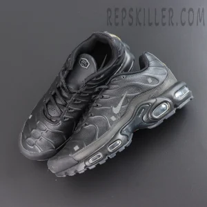 A-COLD-WALL x Nike Air Max Plus ‘Black’ top angle view featuring an all-black leather upper, tonal Swoosh, ACW details, and multiple visible Air units