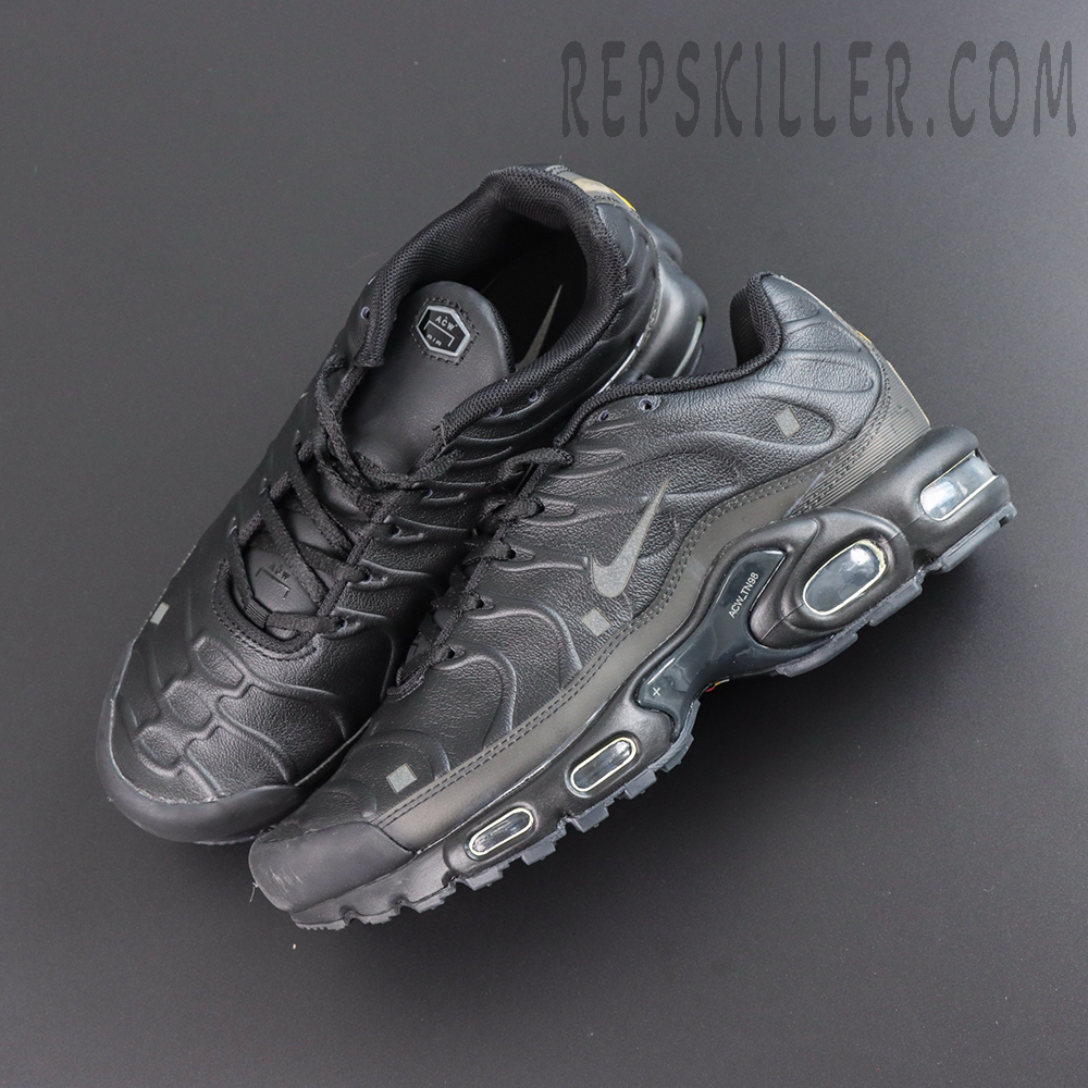 A-COLD-WALL x Nike Air Max Plus ‘Black’ top angle view featuring an all-black leather upper, tonal Swoosh, ACW details, and multiple visible Air units