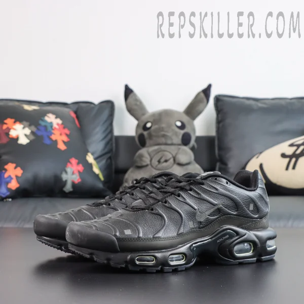 A-COLD-WALL x Nike Air Max Plus ‘Black’ front side view featuring sculpted black leather, tonal Swoosh branding, square accents, and Tuned Air cushioning