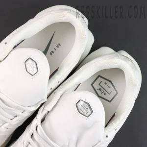 A-COLD-WALL x Nike Air Max Plus ‘Platinum Tint’ tongue and interior close-up featuring white leather tongues, hexagonal ACW Air branding, and collaborative insole graphics