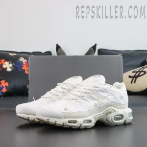 A-COLD-WALL x Nike Air Max Plus ‘Platinum Tint’ pair angle view featuring a minimalist white leather upper, ACW collaboration details, and classic Tuned Air cushioning
