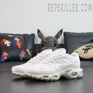 A-COLD-WALL x Nike Air Max Plus ‘Platinum Tint’ front angle view featuring platinum white leather textures, a beige Swoosh, and visible Air cushioning