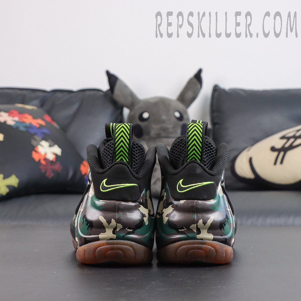 Nike Air Foamposite Pro ‘Green Camo’ rear view featuring camouflage shell, black collar, neon green Nike Swoosh and heel pull tabs