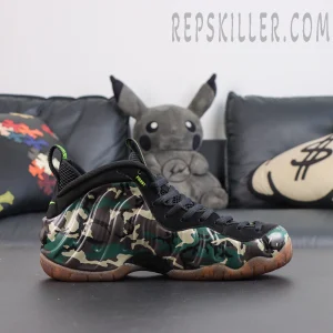 Nike Air Foamposite Pro ‘Green Camo’ medial side view featuring camouflage Foamposite shell, black upper and gum outsole