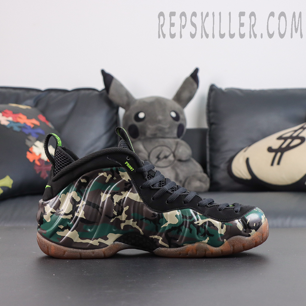 Nike Air Foamposite Pro ‘Green Camo’ medial side view featuring camouflage Foamposite shell, black upper and gum outsole