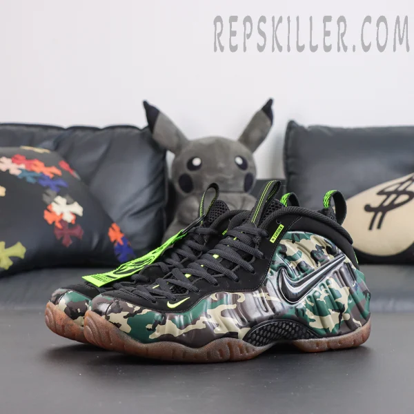 Nike Air Foamposite Pro ‘Green Camo’ pair side view showcasing black Swoosh, camouflage shell and vibrant neon green accents