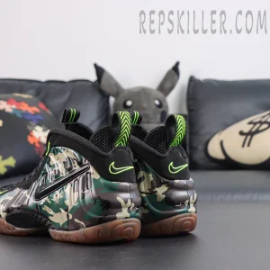 Nike Air Foamposite Pro ‘Green Camo’ rear angled view featuring raised black Swoosh, camouflage Foamposite shell and gum outsole