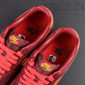 Nike Air Force 1 Low ‘Patent Leather Dark Team Red’ collar and insole view featuring red lining and Nike Air Force 1 branding details