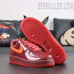 Nike Air Force 1 Low ‘Patent Leather Dark Team Red’ outsole view featuring a full red rubber sole with classic Air Force 1 traction pattern