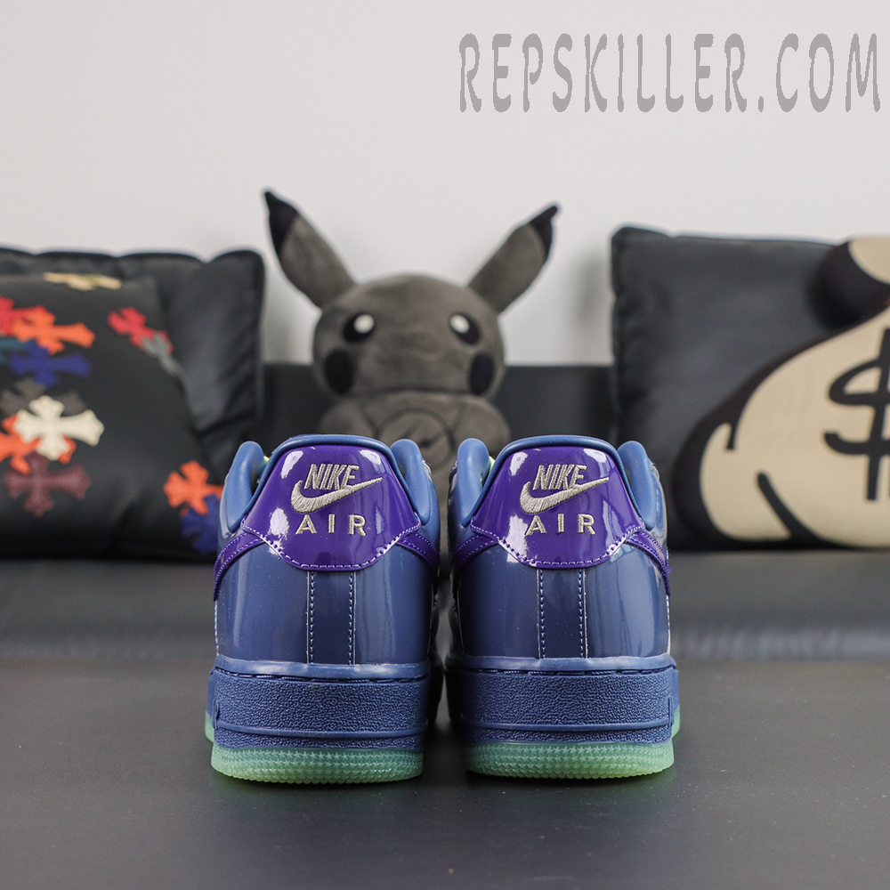 Nike Air Force 1 Low QS ‘Mystic Navy’ rear detail featuring Nike Air branding and purple patent leather heel tabs