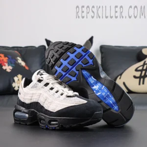 Nike Air Max 95 ‘Big Bubble - Family Reunion France’ outsole view featuring black rubber traction, blue accents and visible Air cushioning