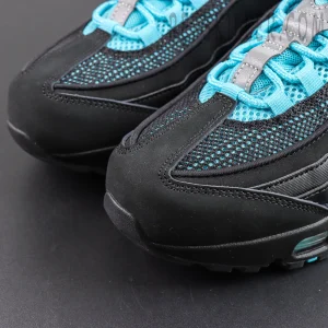 Nike Air Max 95 ‘Big Bubble - Scorpion’ toe box close-up featuring the black suede mudguard, breathable mesh upper and icy blue lace details