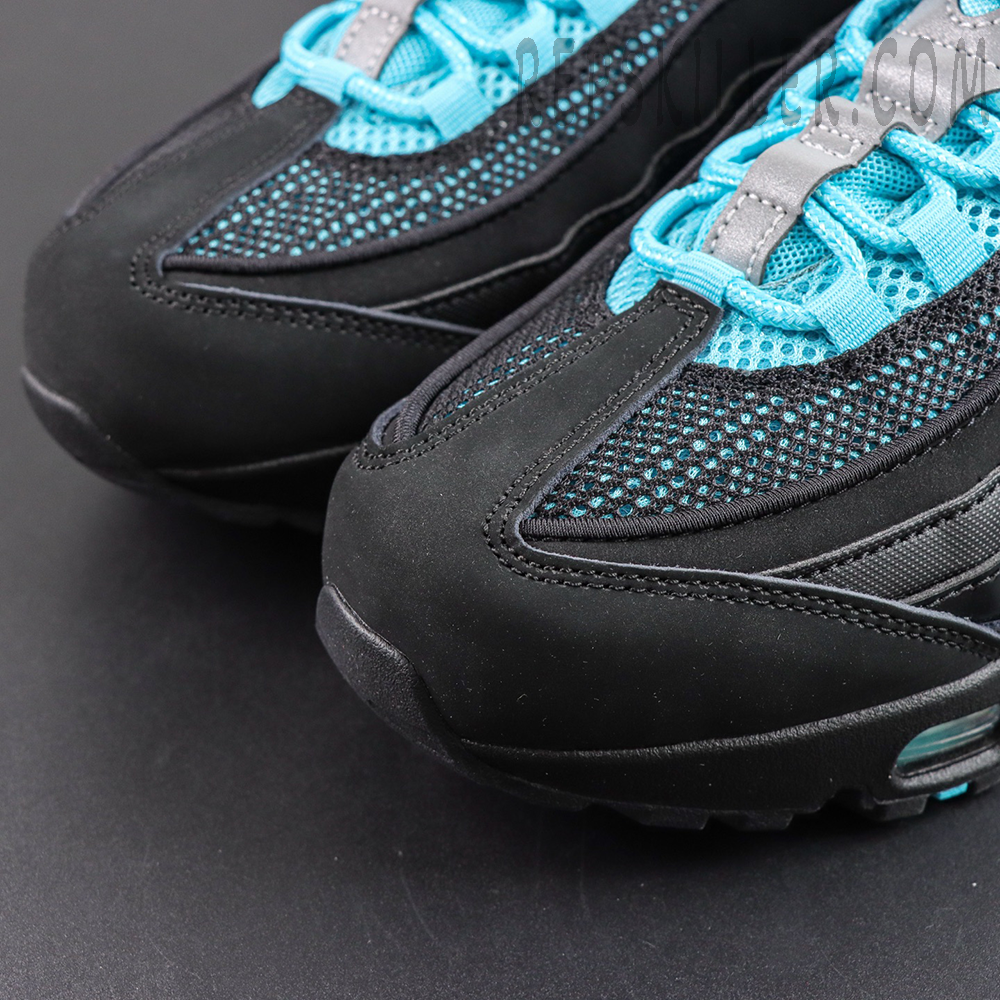 Nike Air Max 95 ‘Big Bubble - Scorpion’ toe box close-up featuring the black suede mudguard, breathable mesh upper and icy blue lace details