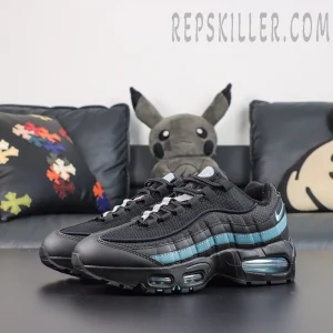 Nike Air Max 95 ‘Smokey Blue’ front angle view featuring black mesh, layered upper construction, smoky blue accents, and a reinforced black toe