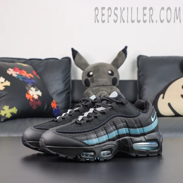 Nike Air Max 95 ‘Smokey Blue’ front angle view featuring black mesh, layered upper construction, smoky blue accents, and a reinforced black toe