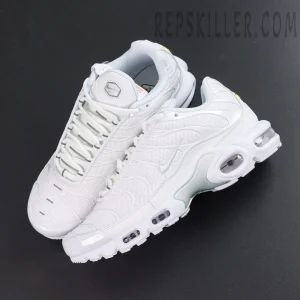 Nike Air Max Plus ‘Triple White’ top view featuring white laces, mesh construction, and silver-white TPU supports in a clean monochrome design
