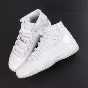 Comme des Garçons x Air Jordan 11 Retro ‘White’ top angle view highlighting the white lacing system, leather upper, glossy patent leather, and translucent outsole