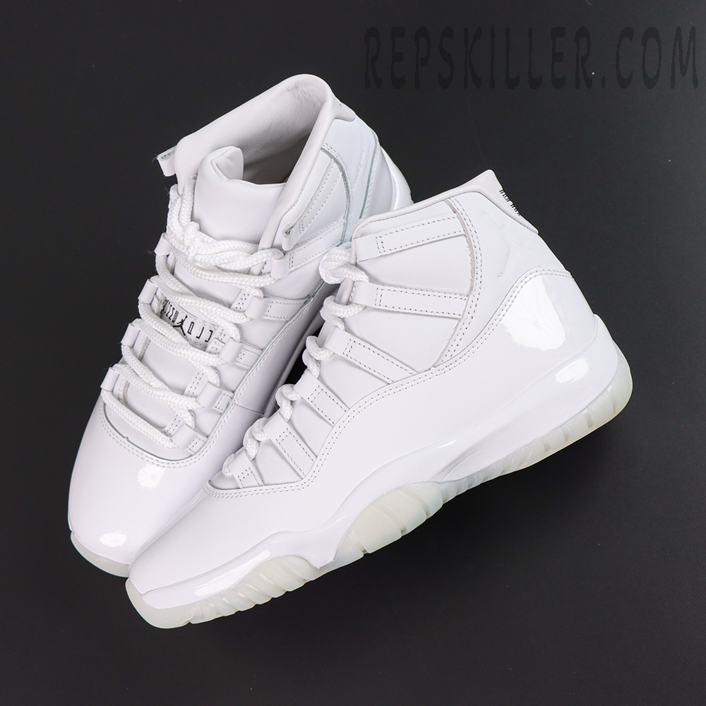 Comme des Garçons x Air Jordan 11 Retro ‘White’ top angle view highlighting the white lacing system, leather upper, glossy patent leather, and translucent outsole