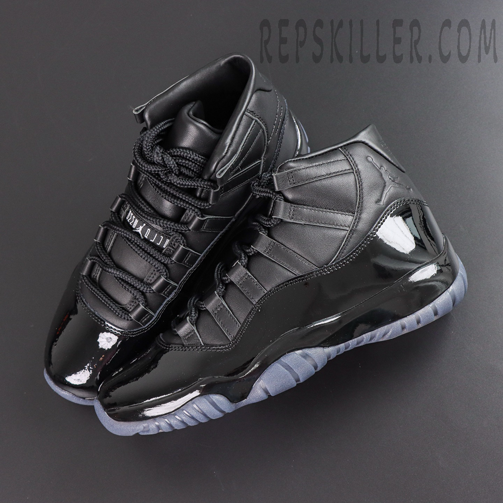 Comme des Garçons x Air Jordan 11 Retro ‘Black’ top angle view featuring black leather uppers, glossy patent leather mudguards, embossed Jumpman branding, and translucent grey outsoles