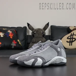 Air Jordan 14 Retro ‘Flint Grey’ front angle view featuring a grey suede upper, dark grey hairy suede overlays, metallic silver midsole details, and a Jumpman badge