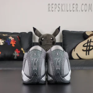 Air Jordan 14 Retro ‘Flint Grey’ rear view highlighting grey heel panels, Jumpman logos, 23 branding, and a dark grey rubber outsole