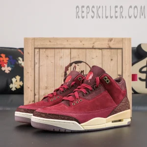 Air Jordan 3 Retro ‘Bin23’ pair display featuring the limited edition burgundy colorway, elephant print overlays and cream midsole design
