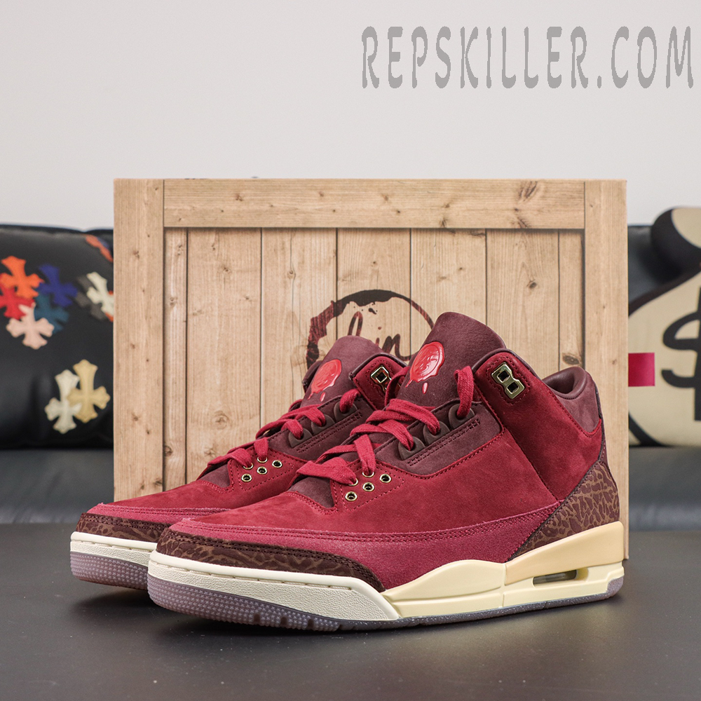 Air Jordan 3 Retro ‘Bin23’ pair display featuring the limited edition burgundy colorway, elephant print overlays and cream midsole design