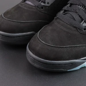 Air Jordan 5 Retro ‘Halloween’ toe close-up highlighting the black suede texture and iconic AJ5 detailing