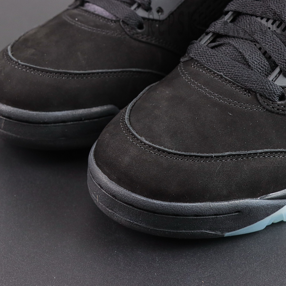 Air Jordan 5 Retro ‘Halloween’ toe close-up highlighting the black suede texture and iconic AJ5 detailing
