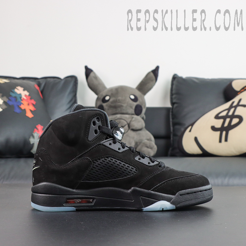 Air Jordan 5 Retro ‘Halloween’ lateral view featuring a black upper, translucent mesh panels and red shark tooth detailing