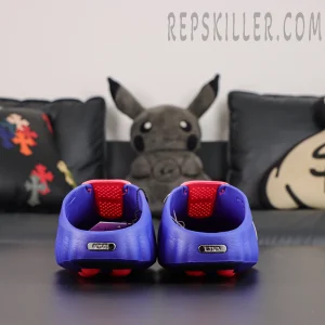 Nike Mind 001 AMP ‘Indigo Burst’ rear view featuring an indigo molded upper, red lining, metallic Nike heel branding, and red outsole nodes
