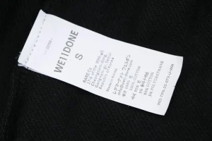 We11done Distressed 11 Logo Printed Wide Leg Pants Wash label