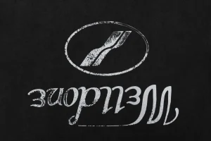We11done Reversed Slogan Graphic Print T-Shirt Front Print