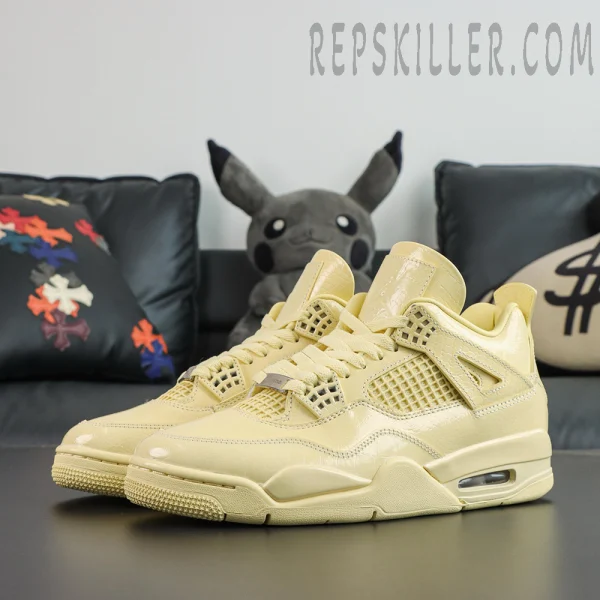 J. Balvin x Air Jordan 4 Retro ‘Amazonas : Lemonade’ front three-quarter pair view with pale lemonade patent uppers, mesh tongues, wing panels, and visible Air units