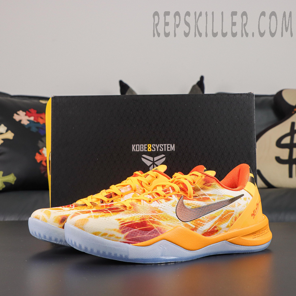 Kobe 8 ‘Shanghai Firework Spark’ pair displayed with a Kobe System shoebox, featuring orange and yellow firework graphics, dark Swoosh branding, orange heel support, and an icy outsole