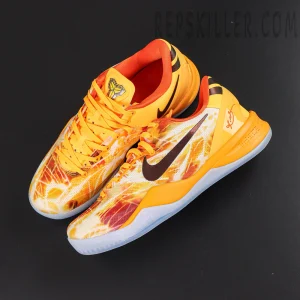 Kobe 8 ‘Shanghai Firework Spark’ top angle view featuring lightweight mesh uppers with orange, yellow and red firework graphics, orange laces, dark Swoosh logos, and icy blue outsoles