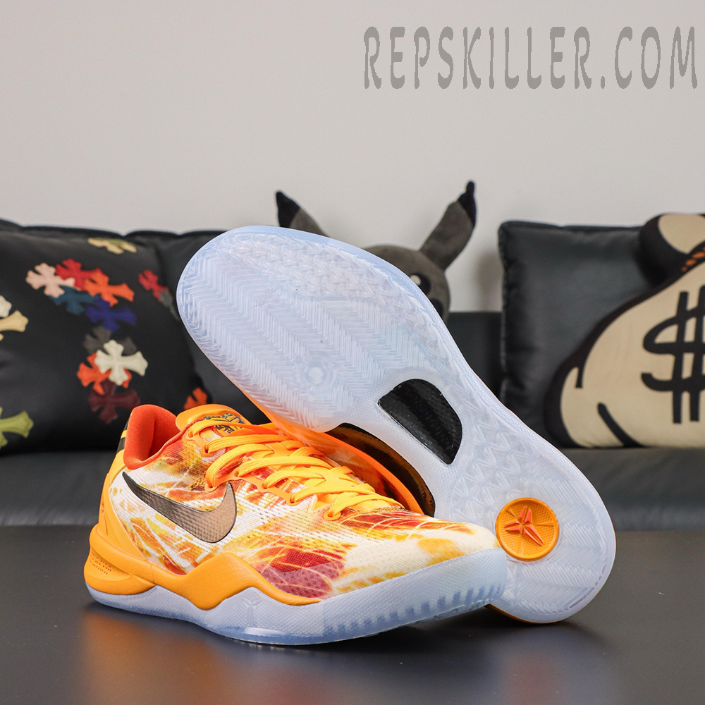 Kobe 8 ‘Shanghai Firework Spark’ outsole view featuring icy translucent rubber traction, a black midfoot section, and orange Kobe logo detail