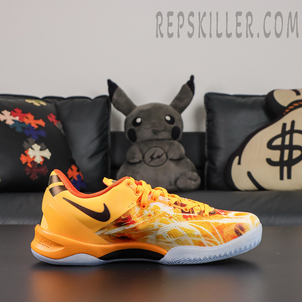 Kobe 8 ‘Shanghai Firework Spark’ side profile featuring an orange and yellow firework-print engineered mesh upper, black Swoosh, orange heel support, and icy translucent outsole