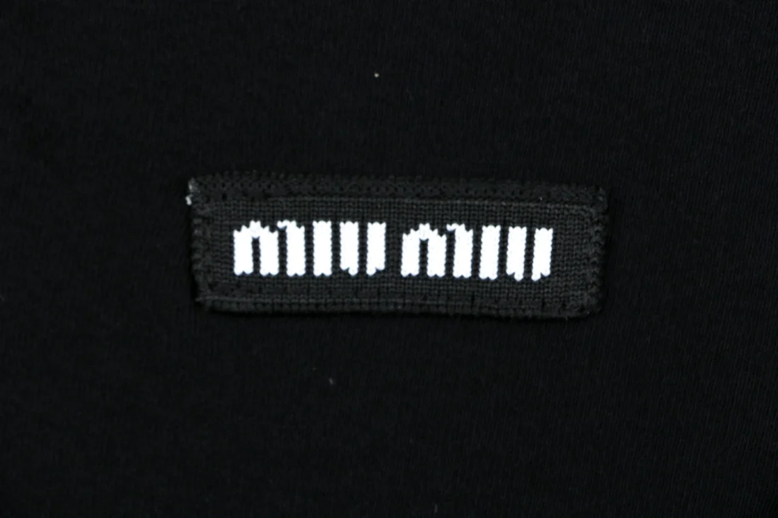 Miu Miu Logo Patch Relaxed Polo Shirt Brand