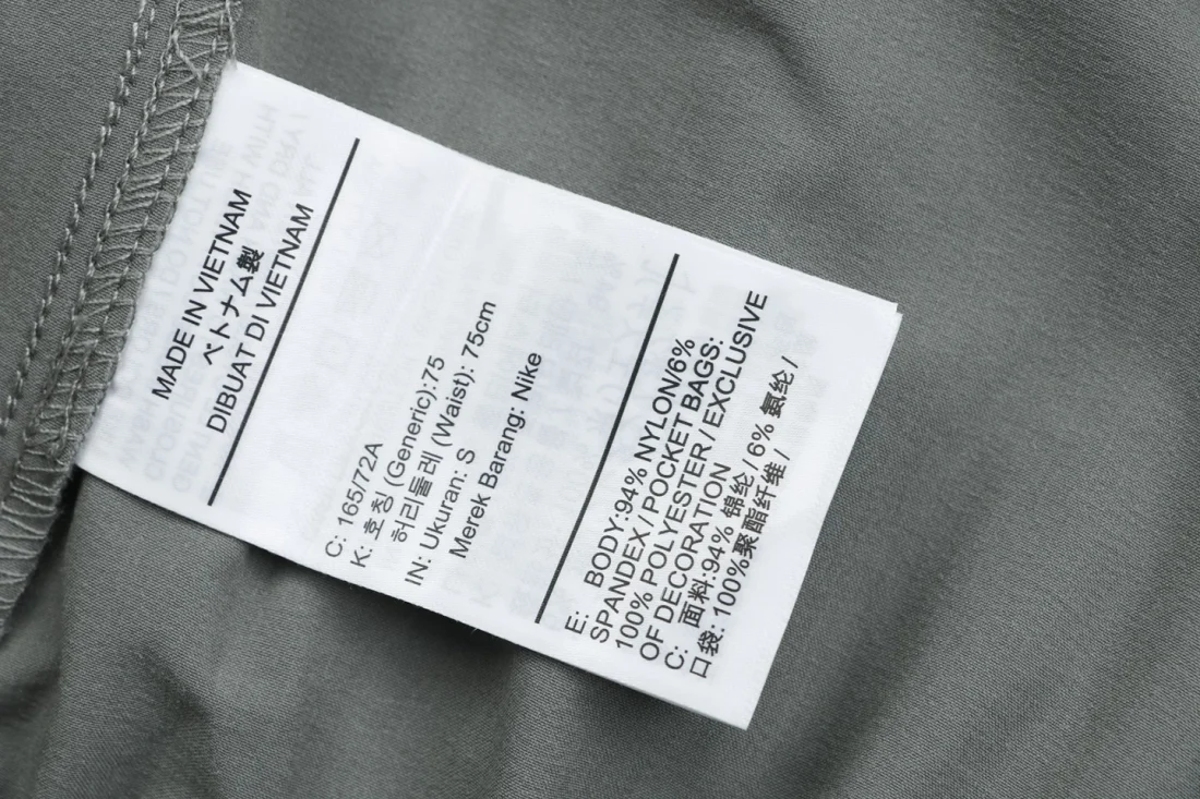 Nike Tech Wide-Leg Utility Pants Grey Wash label