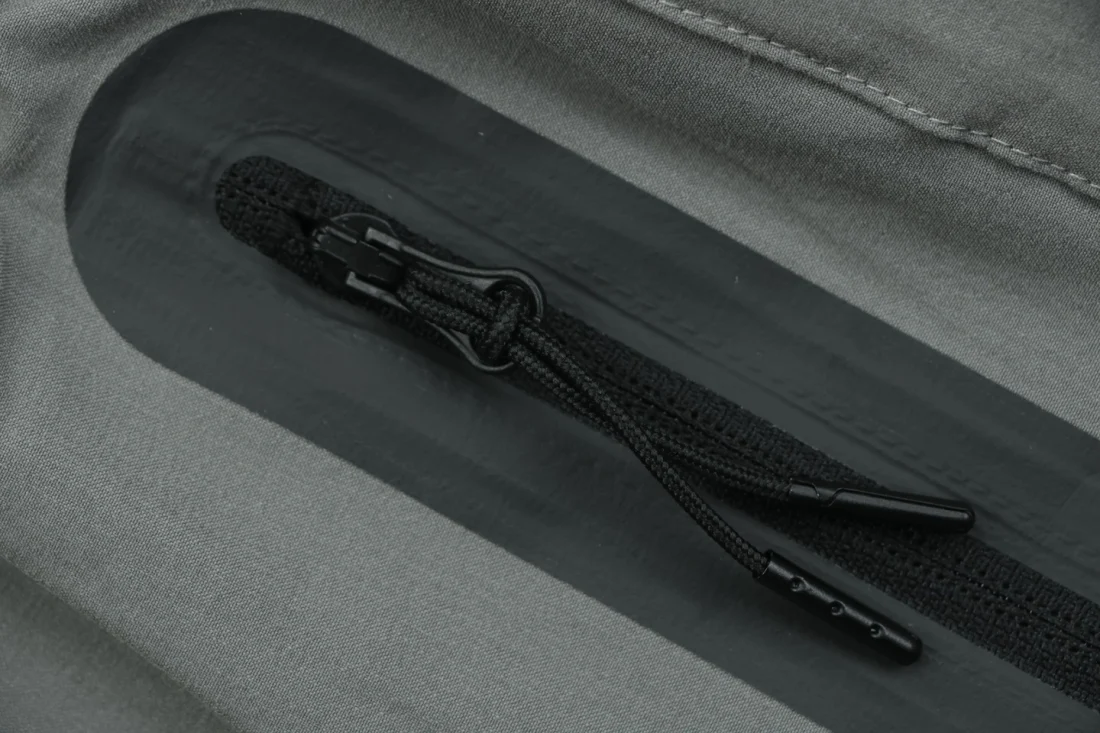 Nike Tech Wide-Leg Utility Pants Grey Zipper puller