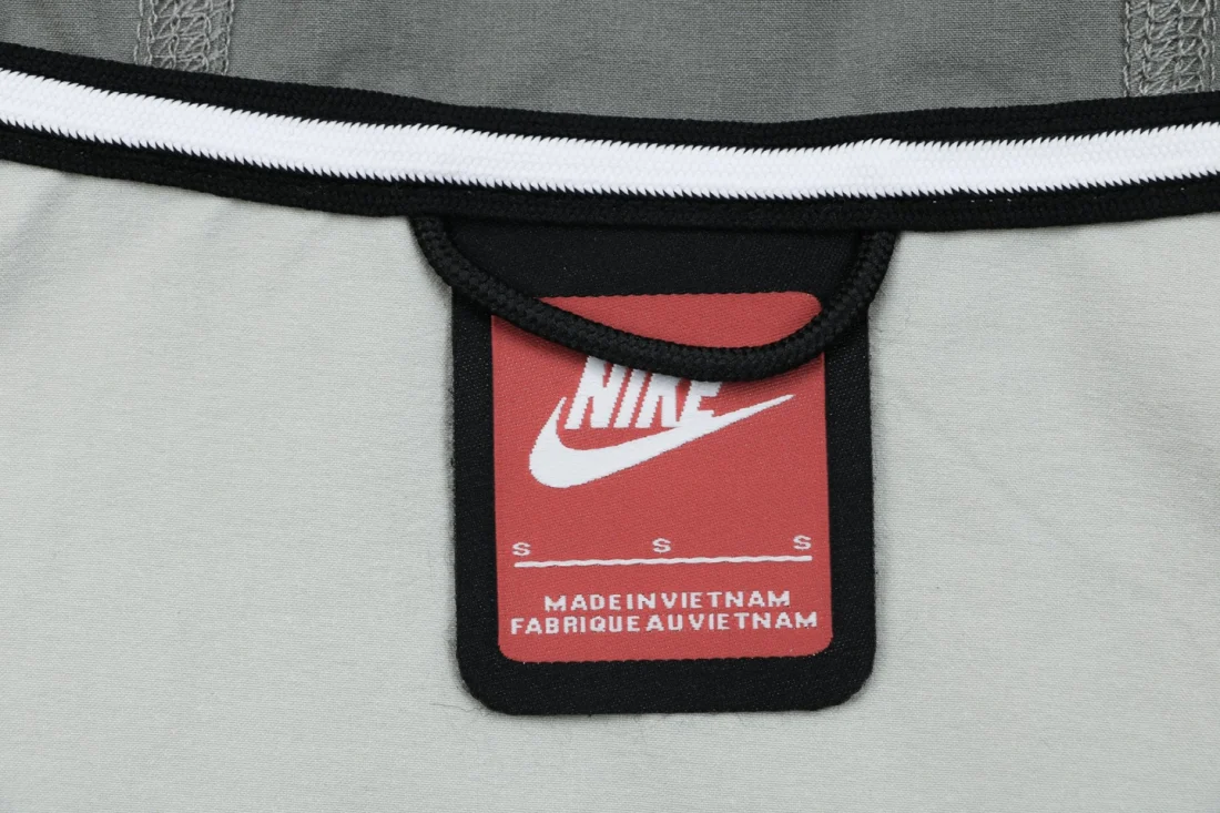 Nike Tech Windrunner V-Line Hooded Jacket Grey Brand label