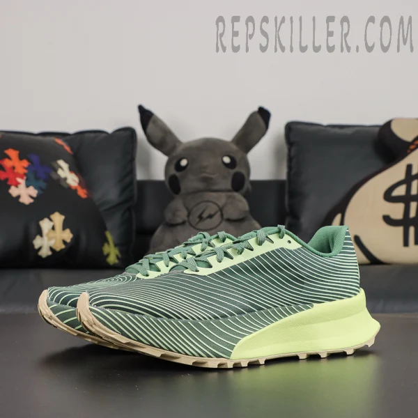 Nike ACG ZoomX Ultrafly Trail Dutch Green Barely Volt side view featuring a wave-pattern upper and bright yellow-green cushioned midsole.