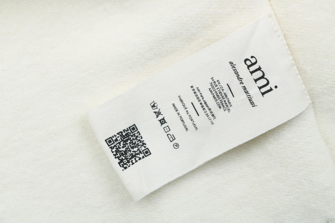 AMI Paris Ami de Coeur Heart Logo Button-Up Cardigan Wash label